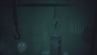 Grab the hook to reach another room (Image via Sportskeeda Gaming || Supermassive Games)